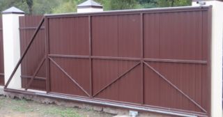 Купить откатные ворота из профнастила Бирск, цена от 1764 руб.