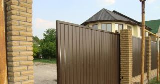 Купить откатные ворота из профнастила Бирск, цена от 1764 руб.